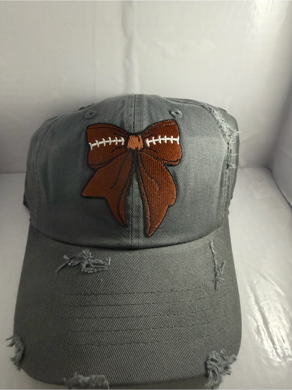 Football bow hat